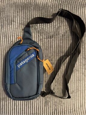 Navy and Blue Sling Belt Bag with Orange Accents